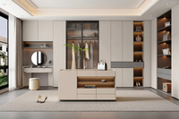 Armoire dressing moderne sur mesure avec cadre en panneaux de particules, portes vitrées, éclairage LED et rangement pour chambre à coucher
