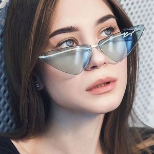 Lunettes de soleil pour femmes, nouvelle mode 2021, monture en alliage rose bleu, UV400, sans monture, œil de chat - Product Image 1