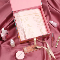 Boîte en papier rigide de maquillage cosmétique avec logo personnalisé en gros Emballage cosmétique magnétique de cadeau de luxe avec ruban