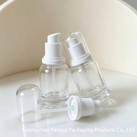 Flacon pompe rond en verre soufflé transparent 30ml 50ml avec surface givrée pour emballage de sérum cosmétique, huile essentielle, soin de la peau