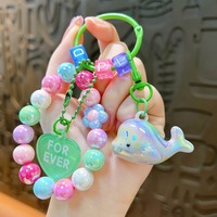 Nouveau dessin animé acrylique lapin perlé bracelet femme pendentif créatif couple voiture sac porte-clés cadeaux en gros