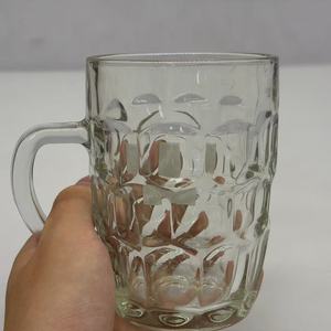 Mug en verre transparent gaufré à fossettes avec poignée et base épaisse, idéal pour les boissons quotidiennes - Product Image 1