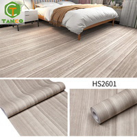 Rouleau de vinyle PVC auto-adhésif imperméable à l'eau à effet bois moderne pour le sol du salon