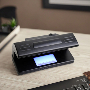 เครื่องตรวจจับธนบัตร<span class=keywords><strong>ปลอม</strong></span>แบบมืออาชีพ DC-318 รุ่น UV สำหรับตรวจสอบด้วยแสงอัลตราไวโอเลต 365 นาโนเมตร เหมาะสำหรับธนาคาร ร้านค้าปลีก และซูเปอร์มาร์เก็ต ขายส่ง - Product Image 1