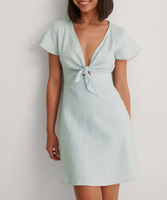 Logo personnalisé Nouveau design de haute qualité Robe à nouer devant Mini robe décontractée Printemps Été Robes en lin pour femmes