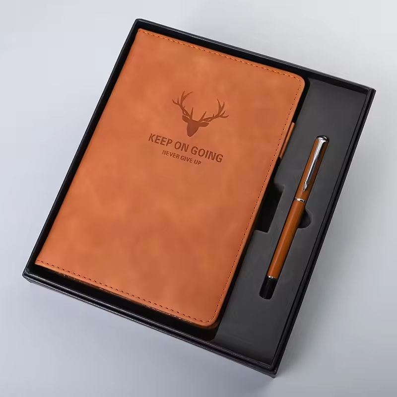 Brown notebook with pen
