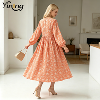 Fabrication OEM Robe midi coupe trapèze à taille haute, col à revers, manches lanternes, imprimé floral orange, vente en gros d'usine