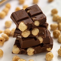 Barra de Chocolate Amargo com Avelã e Amêndoa |   Sabor Rico de Café 100% Manteiga de Cacau |   Nozes Inteiras Crocantes 100g/unidade Prazo de Validade de 12 Meses