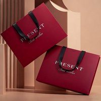 Sacs en papier de luxe pour la vente au détail de vêtements, de cadeaux, de bijoux, avec poignée, personnalisés avec le logo de la marque, pour la promotion