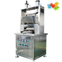Machine de dépose semi-automatique de bonbons durs à servomoteur, petite machine de remplissage pour la production de bonbons durs et de sucettes.