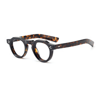 Monture de lunettes épaisse en acétate blanc transparent avec plaque en acétate orange, monture de lunettes épaisse à motif répétitif imitation écaille de tortue ancienne