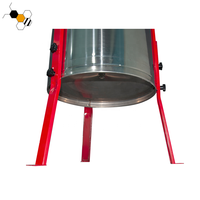 Extracteur de miel centrifuge manuel à 4 cadres avec construction en acier inoxydable et fonctionnement facile