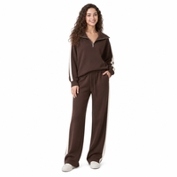 Ensemble deux pièces en maille pour femme avec rayures latérales, col mandarin, coupe classique, printemps, vente en gros directe usine