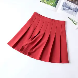 Quantité minimale de commande bas tenue de bureau jupe courte jupe plissée sexy une ligne taille haute été décontracté élastique