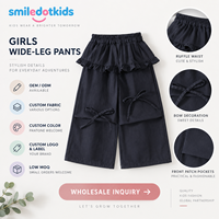 Smiledotkids Pantalon de survêtement personnalisé pour enfants, noir, taille à volants, nœud, poche, coupe large, OEM ODM, direct usine, vente en gros pour tout-petits