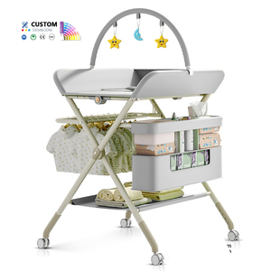 <span class=keywords><strong>Table</strong></span> <span class=keywords><strong>à</strong></span> <span class=keywords><strong>langer</strong></span> multifonctionnelle pliable en plastique et métal pour nouveau-nés, avec fonction massage tactile et lit de bain – Produit de soin pour bébé - Product Image 1