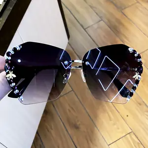 Keloyi femmes Logo personnalisé filles Bling dame fournisseur nuances mode gemme métal inoxydable concepteur vendeur UV400 lunettes de soleil