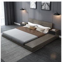 Lit superposé japonais moderne et simple, couleur crème, avec armoire latérale de rangement et design à panneaux, écologique, idéal pour les petits appartements et salons.