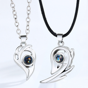 Go Party <span class=keywords><strong>HOT</strong></span> i-love-You 100 langue <span class=keywords><strong>Couple</strong></span> collier titane en acier en forme de cœur Attraction magnétique <span class=keywords><strong>Couple</strong></span> colliers assortis - Product Image 1