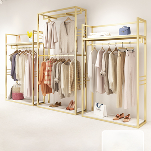 Özel paslanmaz çelik bez ekran standları kadın kıyafetleri ekran rafları Metal perakende butik altın kıyafet rafı - Product Image 1