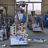 Machine à fabriquer des petits pains vapeur à haute productivité avec fonction de pressage, possibilité d'ajouter des accessoires de presse à gâteau et de couteau de découpe