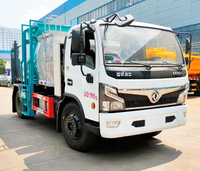 Camion de ramassage des déchets électrique écoénergétique avec réservoir en acier inoxydable hermétique pour l'assainissement municipal