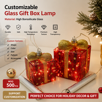 Boîte Cadeau en Verre avec Poignée Lumineuse LED Suspendue, Décoration de Noël, Vente en Gros Fabricant OEM, Rouge Doré, Borosilicate, pour Table