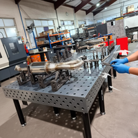 Table de soudage flexible 3D avec grille de trous D16 D28 et dispositifs de positionnement complets pour la production de soudures d'équipements sanitaires