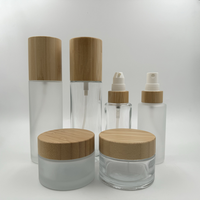 Ensemble d'emballages cosmétiques 50 ml 100 ml 120 ml 150 ml 4 oz Flacon pompe en verre givré 1 oz 2 oz Flacons de sérum et d'huile avec couvercle en bambou