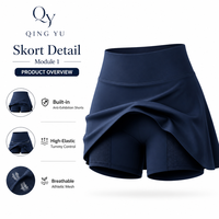 Jupe de tennis premium unie taille haute pour femme, extensible, avec logo frontal, short intégré et poches, idéale pour le yoga, le golf, la course et la gym