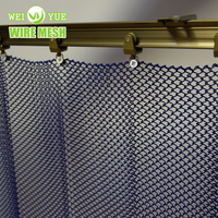 Rideau en maille spirale de draperie de bobine en métal résistant à la corrosion pour entrepôt/cloison de studio/revêtement mural décoratif/ombre de fenêtre
