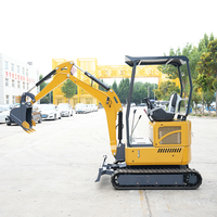 Mini-tractopelle multifonction compacte pour jardinage et travaux agricoles, avec moteur hydraulique sur chenilles