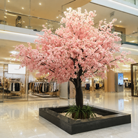 Arbre artificiel de cerisier en fleurs de qualité supérieure, canopée rose pâle pour la conception d'hôtels de luxe, de complexes hôteliers et d'établissements hôteliers