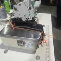 Machine à coudre surjeteuse industrielle à quatre fils Gtrobel GDB-700D/747D d'occasion, 4500 points/min, épaisseur de 12 mm