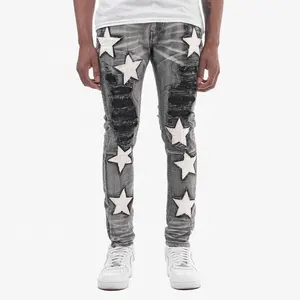 YUEGE özel deri yıldız nakış moda stil Jean adam sıkıntılı yırtık yığılmış kot pantolon