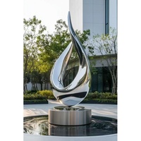 Statue de jardin en métal poli décorative pour l'extérieur de l'hôtel, sculpture en acier inoxydable en forme de goutte d'eau