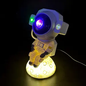 itting position astronaut projection lamp for home astronaut moon lamp decoration room table lamp
