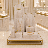 Présentoirs à bijoux en travertin pour vitrine de boutique, présentoirs de comptoir, vitrine modulaire avec bordure dorée pour magasin de détail