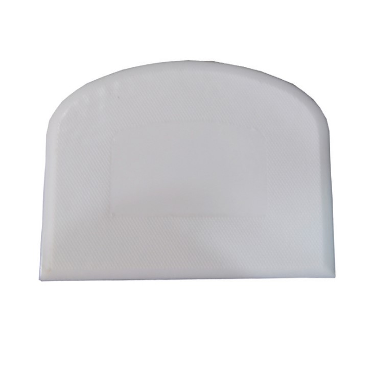 white semicircle plastic scaper