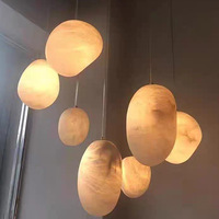 Lustre en marbre naturel de style minimaliste, conçu par des designers, éclairage LED, hauteur réglable, type câble suspendu, pour l'éclairage des hôtels