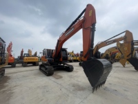 Excavadora Usada DOOSAN DX300 Agile Zero-Tail-Swing para Excavación de Nuevas Líneas de Alcantarillado en Zonas Residenciales Densas
