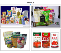 Machine automatique de pesage, de remplissage et de scellage pour sachets préformés (doypacks) pour eau, savon liquide, jus de fruits, huile comestible, soja