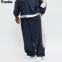 Pantalon de jogging streetwear à jambes larges en nylon avec empiècements, pantalon de survêtement pour homme, taille élastique, pantalon coupe-vent empilé pour homme