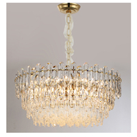 Lampe suspendue LED en cristal nordique moderne et luxueuse avec finition dorée pour la décoration intérieure et l'éclairage domestique