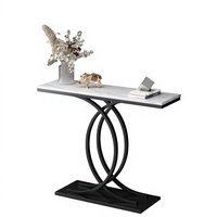 Console d'entrée semi-circulaire en métal avec plateau en dalle de pierre, style luxe léger, pour petits appartements et entrées.