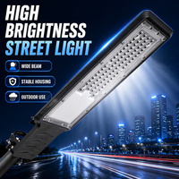 Lampadaire LED économique DOB intégré avec boîtier en aluminium et cellule photoélectrique intégrée, facilement entretenu pour routes, parkings et usines