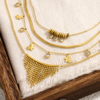Collier superposé en acier inoxydable plaqué or 18 carats avec pendentif papillon en zircon cubique et chaîne chevrons pour femme, vente en gros OEM