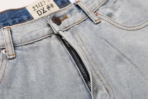 Jeans unisexe vintage <span class=keywords><strong>déchiré</strong></span> coupe évasée <span class=keywords><strong>en</strong></span> denim délavé avec imprimé X pour <span class=keywords><strong>homme</strong></span> et femme, style streetwear, pantalon patte d'éléphant - Product Image 5
