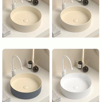 Vasque en céramique blanche crème peinte à la main pour projet de salle de bain d'hôtel de luxe