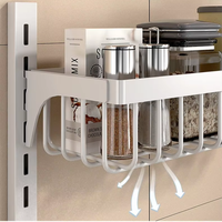 Étagère murale multifonctionnelle en métal sans poinçon pour la cuisine, le four à micro-ondes, les assaisonnements et les bouteilles.